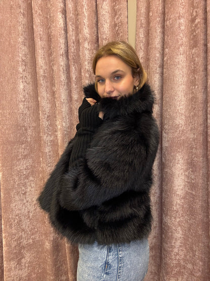 Eco pelliccia con manica a tre quarti