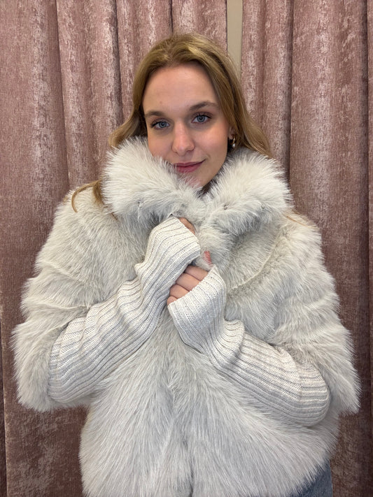 Eco pelliccia con manica a tre quarti